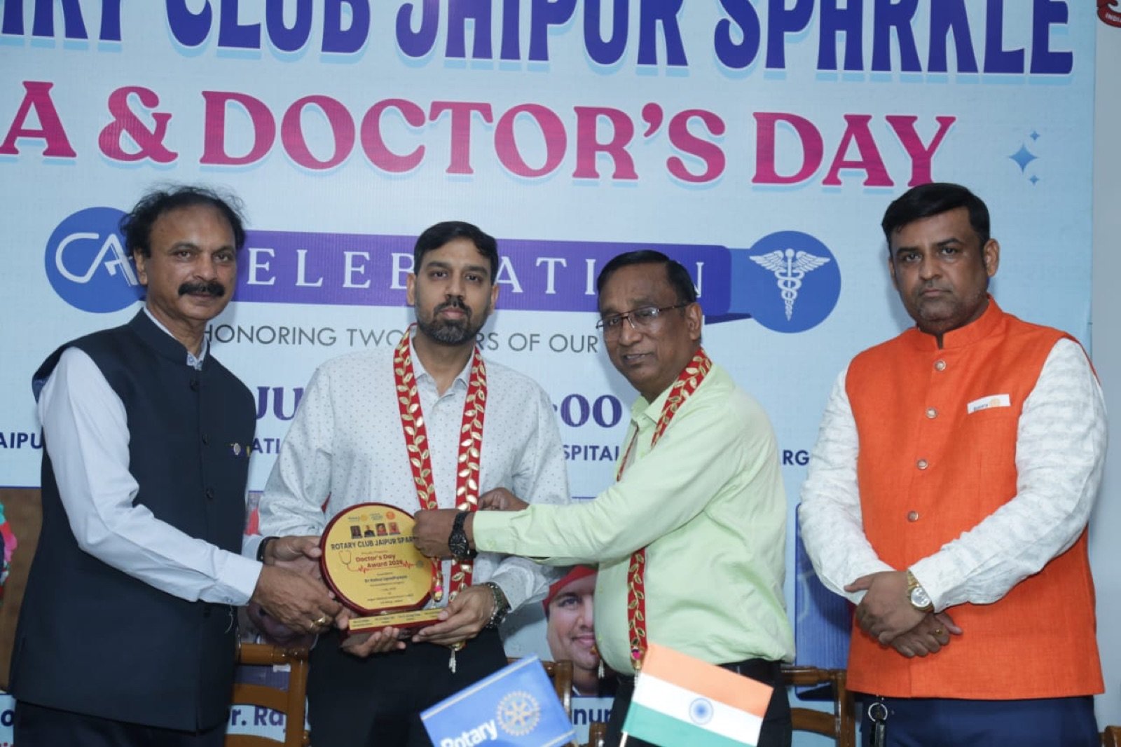 Dr. Rahul Upadhyay receiving Doctor's Day appreciation from the Rotary Club, Jaipur