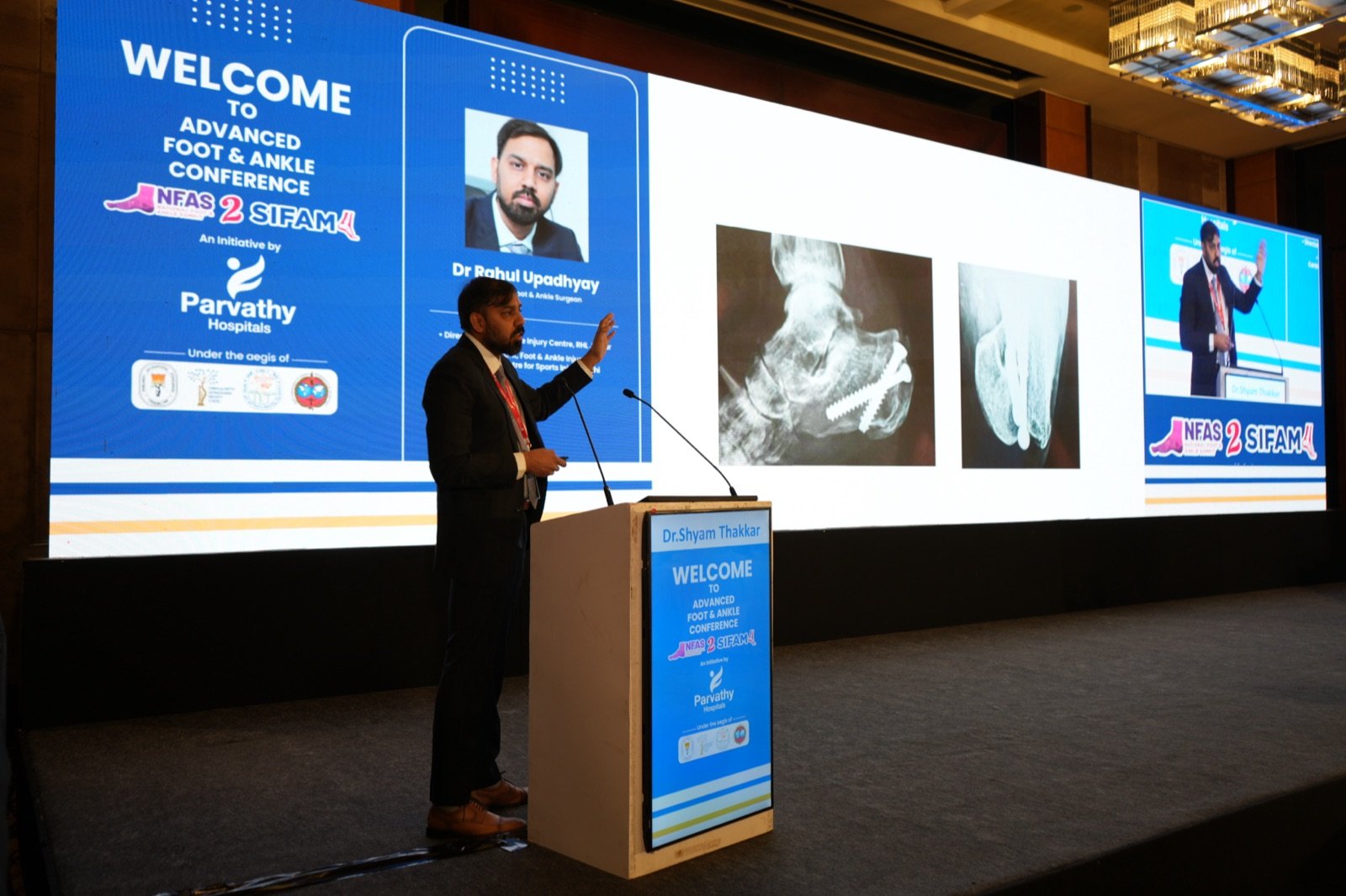 Dr. Rahul Upadhyay speaking on calcaneus fractures at a foot and ankle conference in Chennai